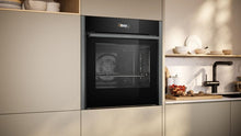 Load image into Gallery viewer, Neff B54CR71G0B 60cm Slide and Hide Built In Electric Single Oven
